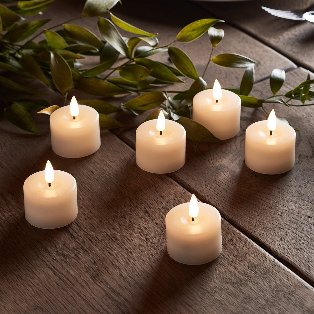 6 Ivory TruGlow® Real Wax LED Mini Votive Candles with Remote Control