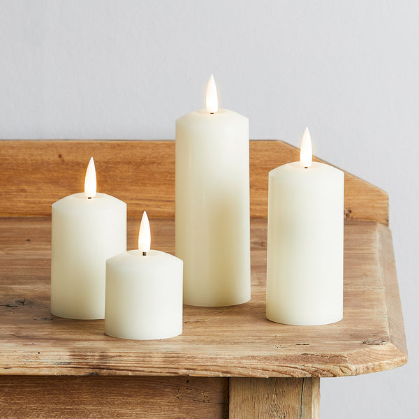 4 TruGlow® Ivory Slim Pillar Candles With Remote Control