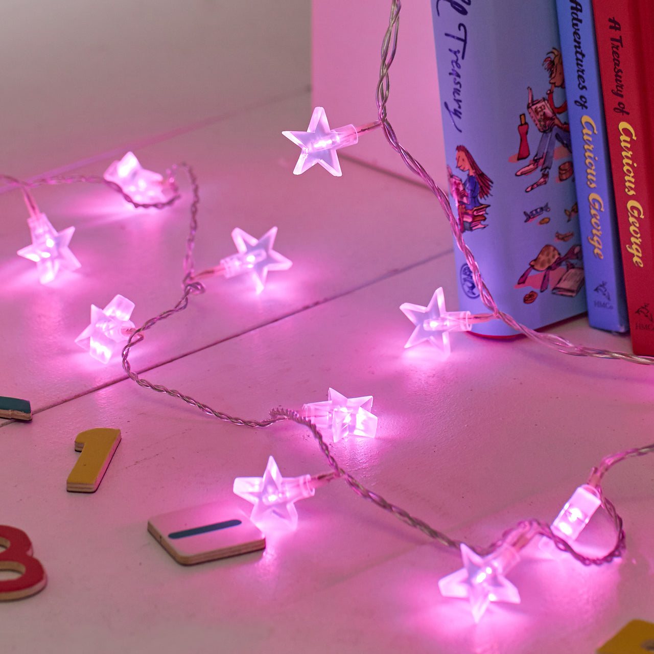 30 Pink LED Star Fairy Lights On Clear Cable