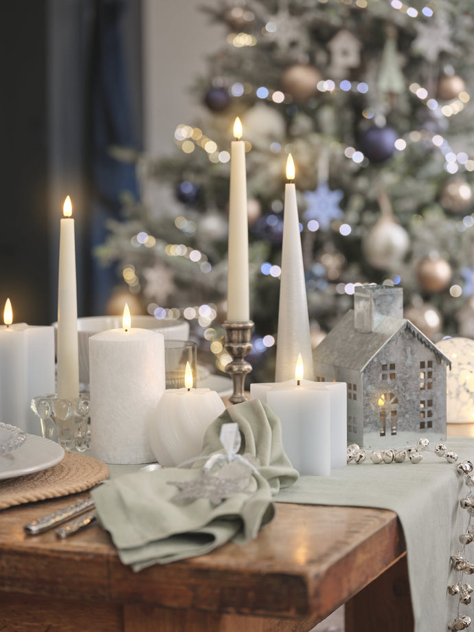 Christmas candles by Christmas tree