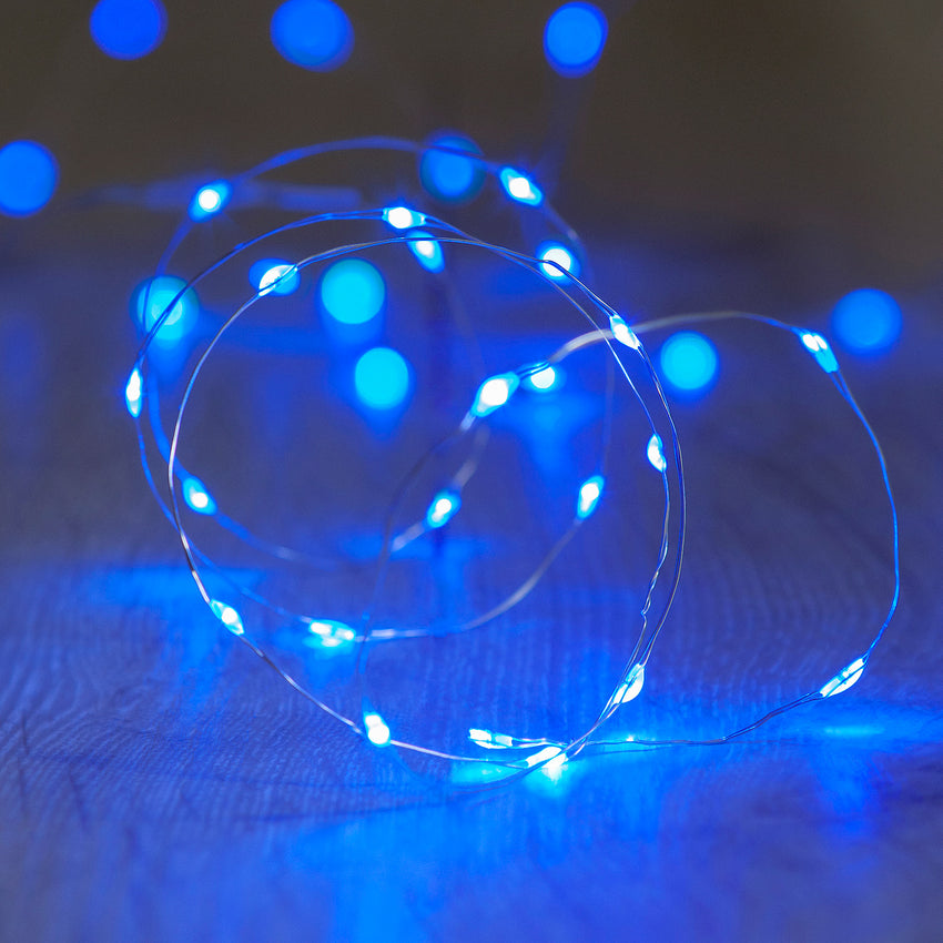 Blue LED micro lights wrapped up and lit on a table