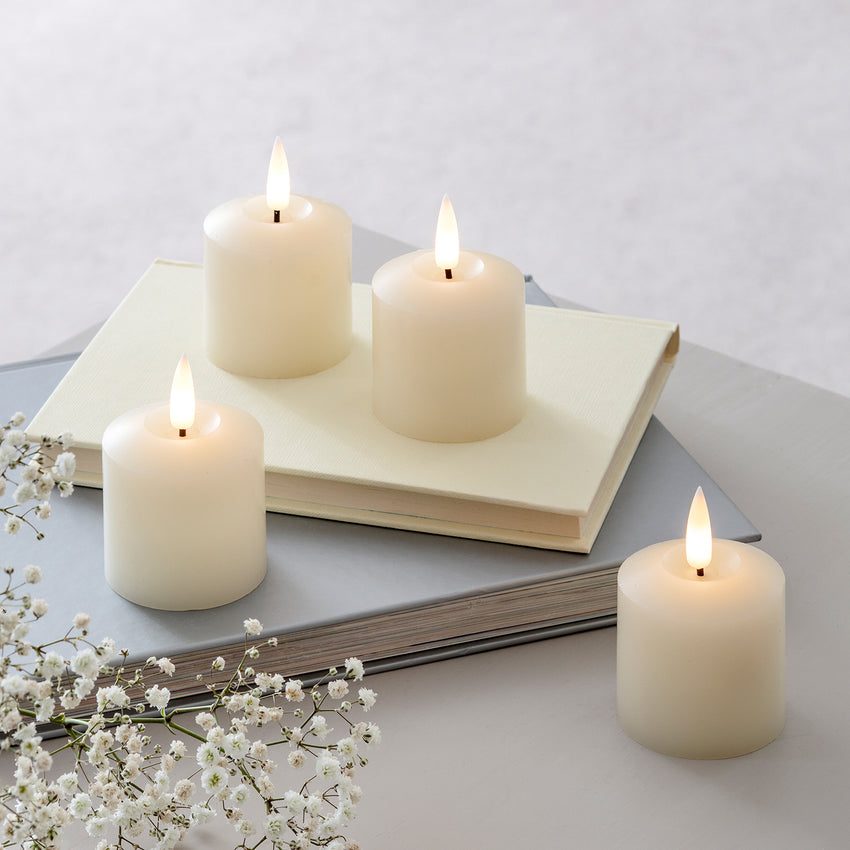 TruGlow LED votive candles as part of a table display