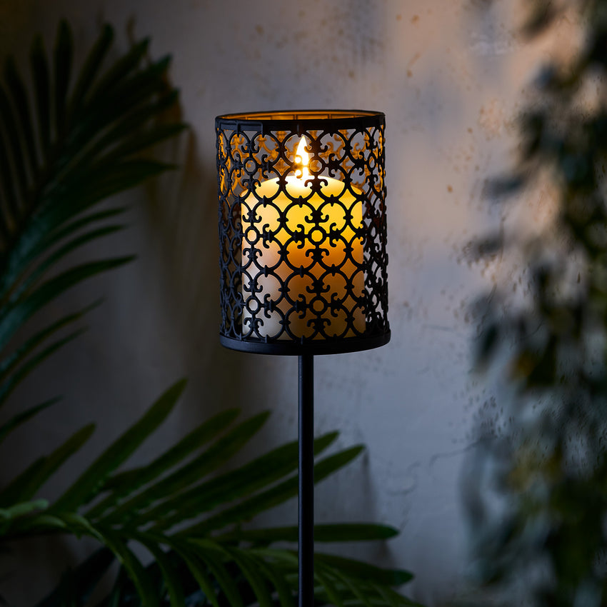 Black garden stake light with LED candle