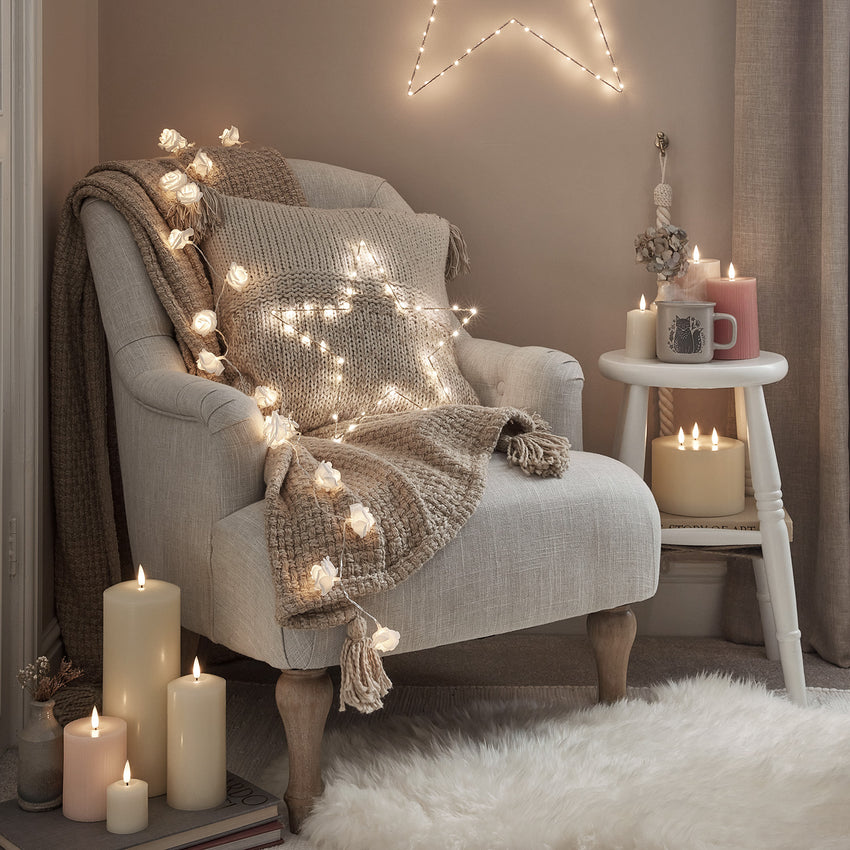 Brass micro battery festoon lights illuminated