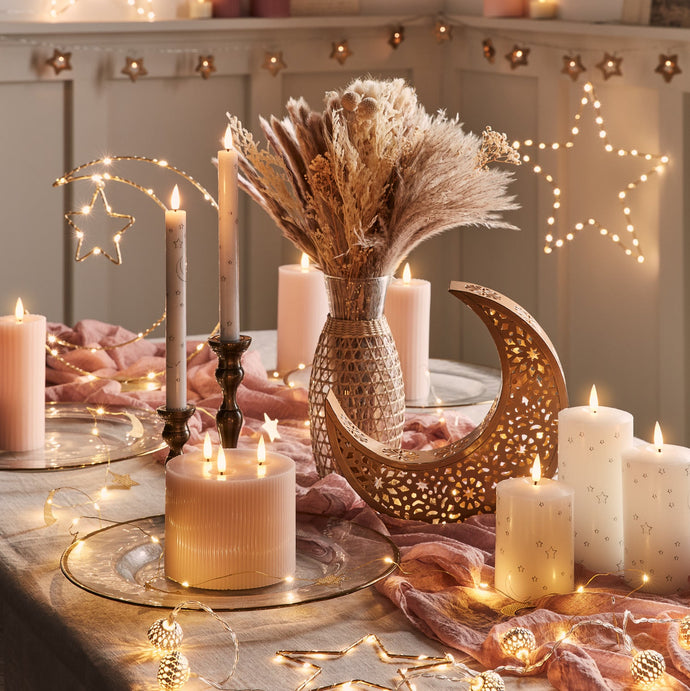 Ramadan Lights & Decorations | Gold osby star on mantlepiece