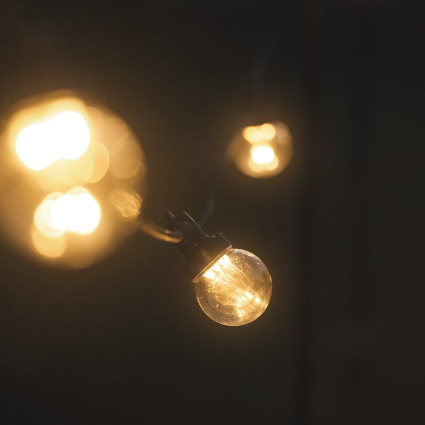Multi coloured festoon lights illuminated