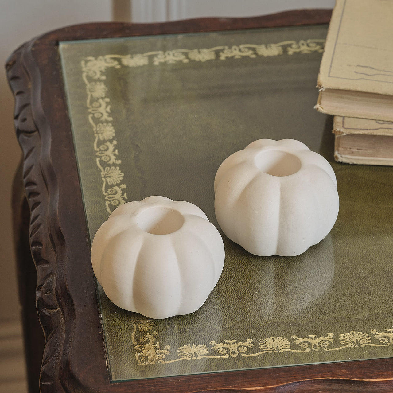 Set of 4 TruGlow® Ivory LED Taper Candles and Matte White Ceramic Pumpkin Taper Candle Holders