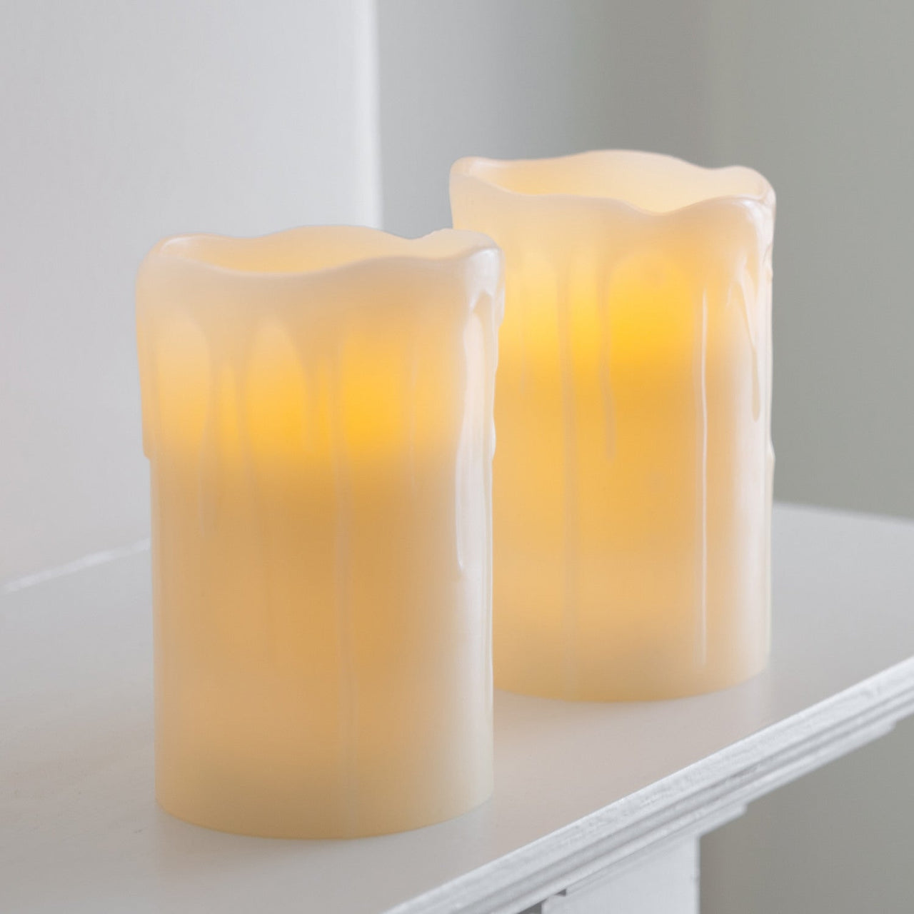 CA13854T_Battery-Dripping-Wax-LED-Pillar-Candles-Mantelpiece-White_P1.jpg
