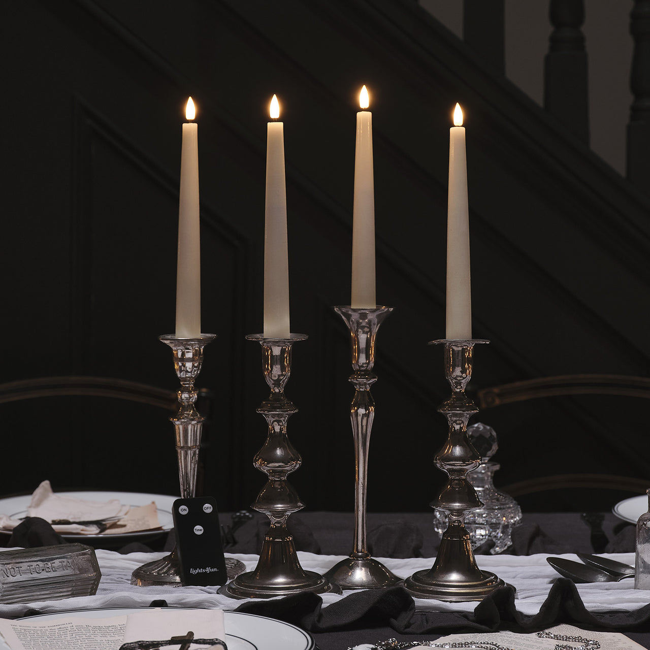 4 Ivory TruGlow® LED Taper Candles with Remote Control