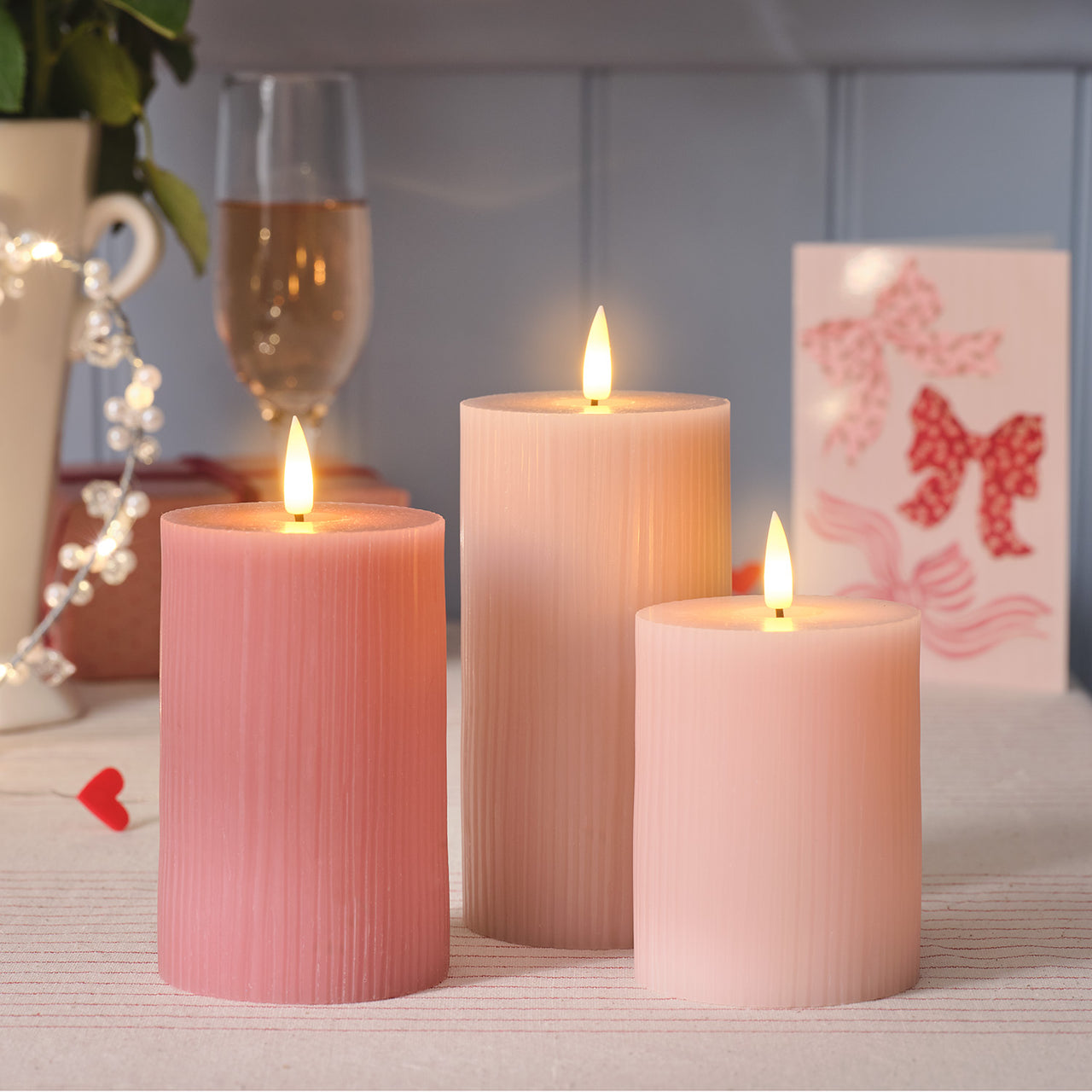 TruGlow® Blush Pink Ribbed LED Pillar Candle Trio