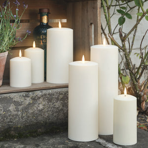 Six outdoor LED candles in different sizes