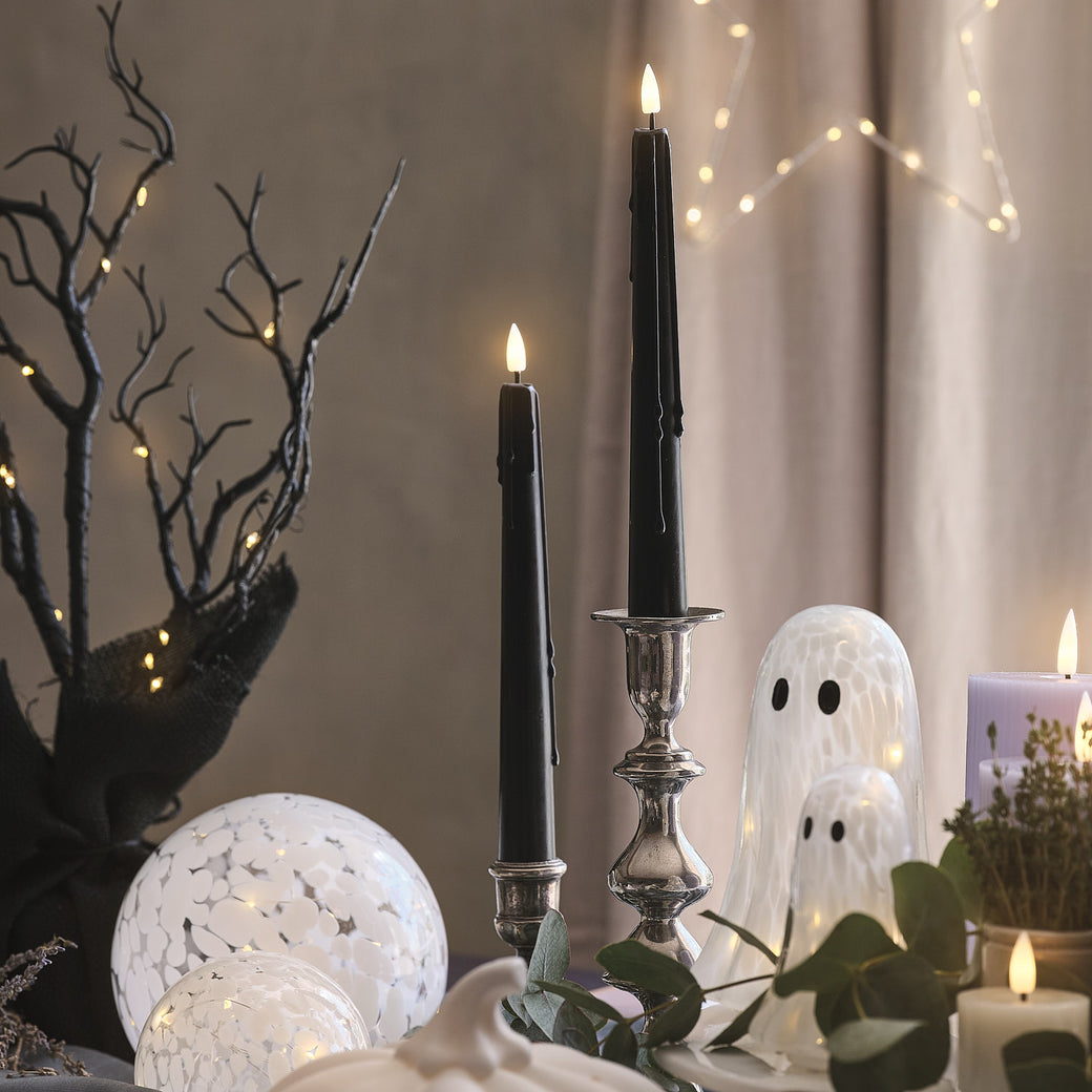 LED black taper candles with dripping wax effect