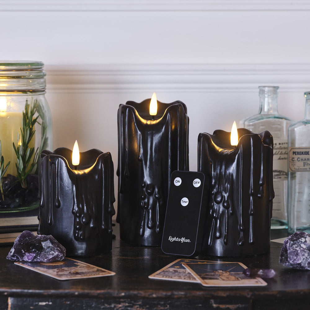 CA24036_4_-3BlackHeavyDrippingWaxTruGlow_Candles.jpg
