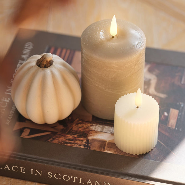 LED candles and porcelain pumpkin decoration