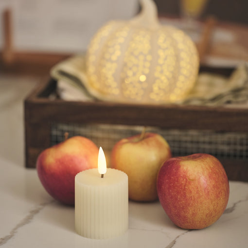 Ribbed ivory votive candle