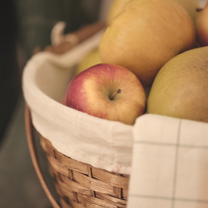 Apples in a woven basket