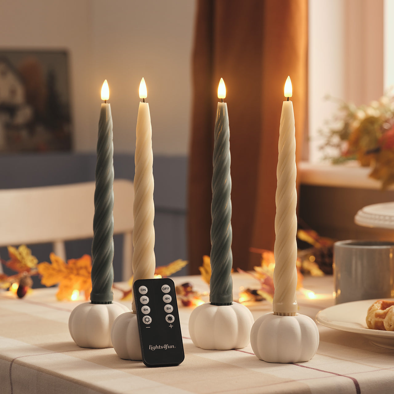 Set of 4 TruGlow® Cream and Dark Green Twisted LED Taper Candles and White Ceramic Pumpkin Taper Candle Holders