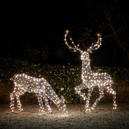 Decorative light-up deer in a holiday scene