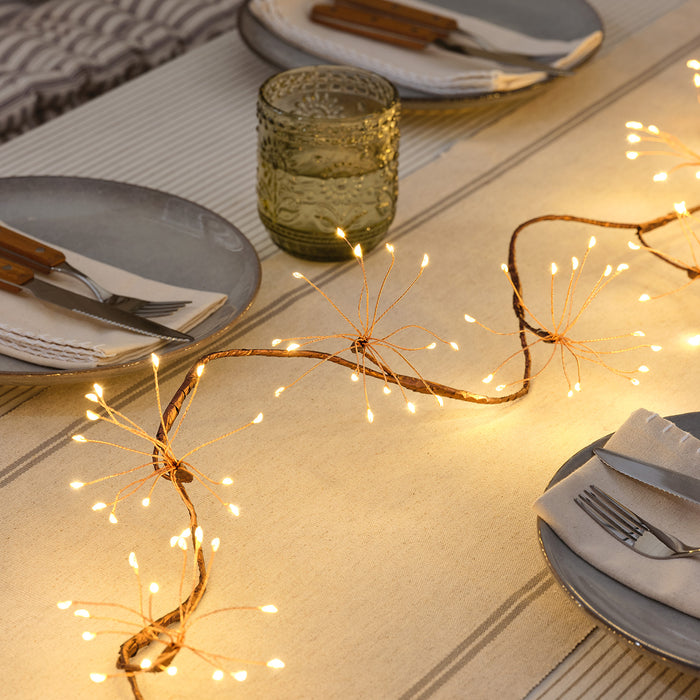 Gold starburst garland draped across a table