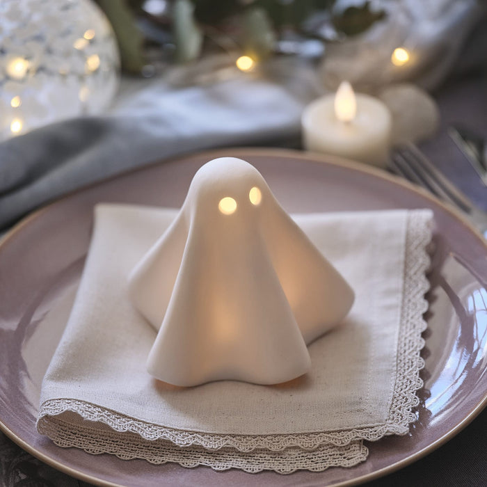 Porcelain ghost on a dining place setting