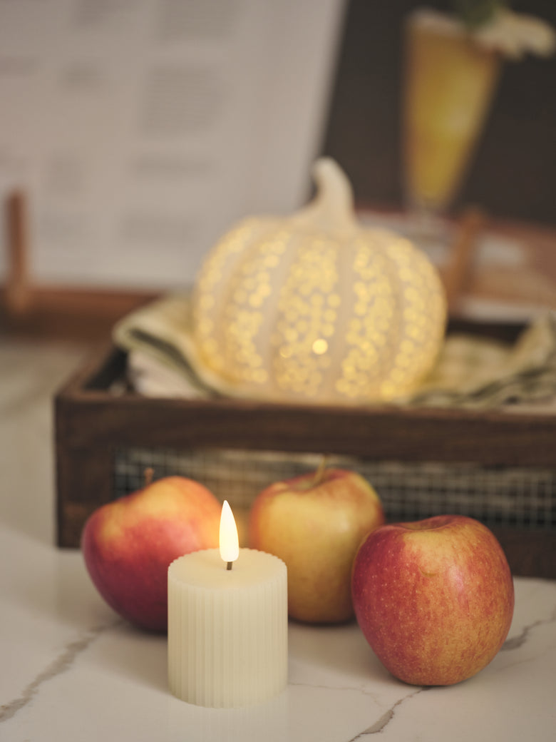 Ribbed ivory votive candle