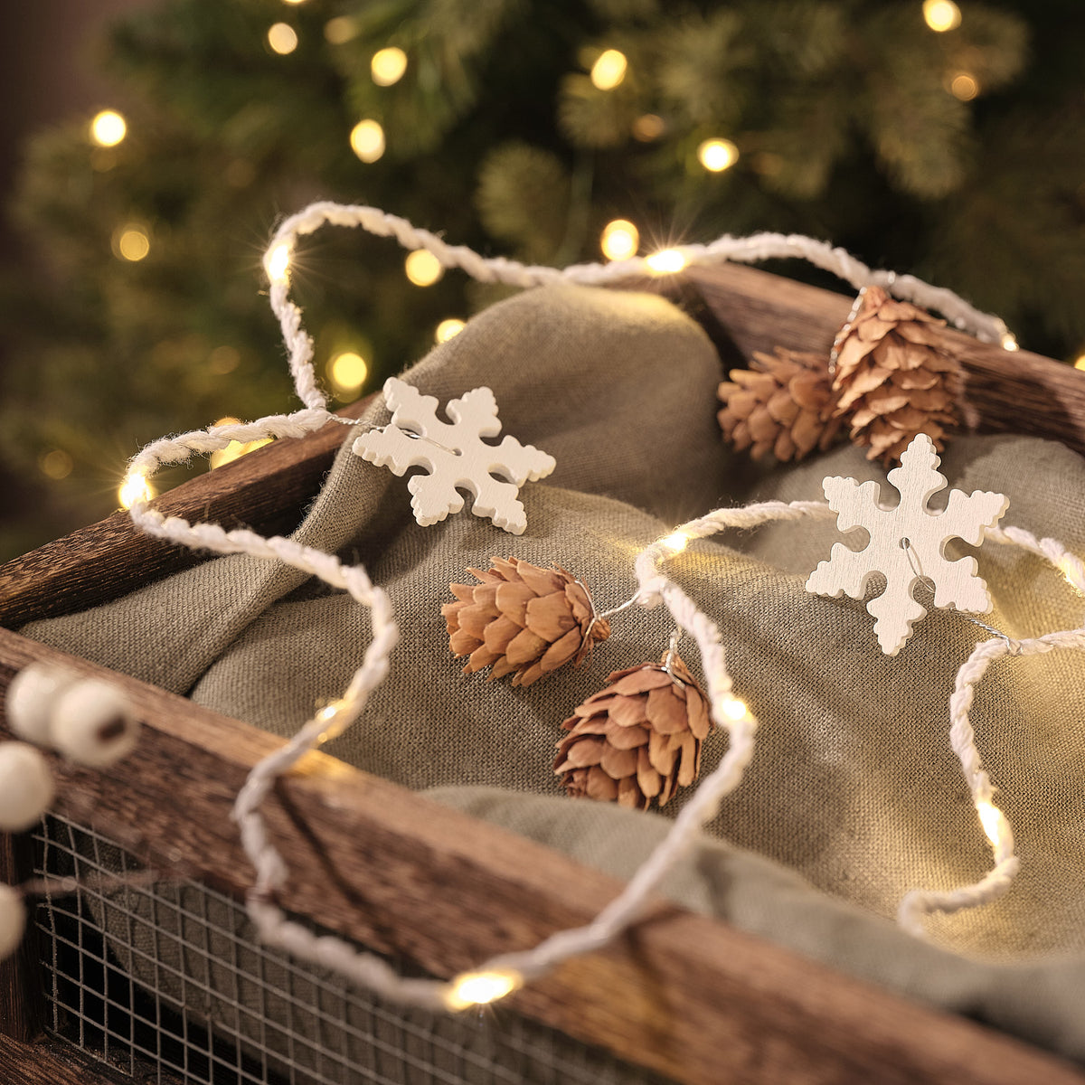 1.8m Snowflake & Pinecone Light Up Micro LED Garland