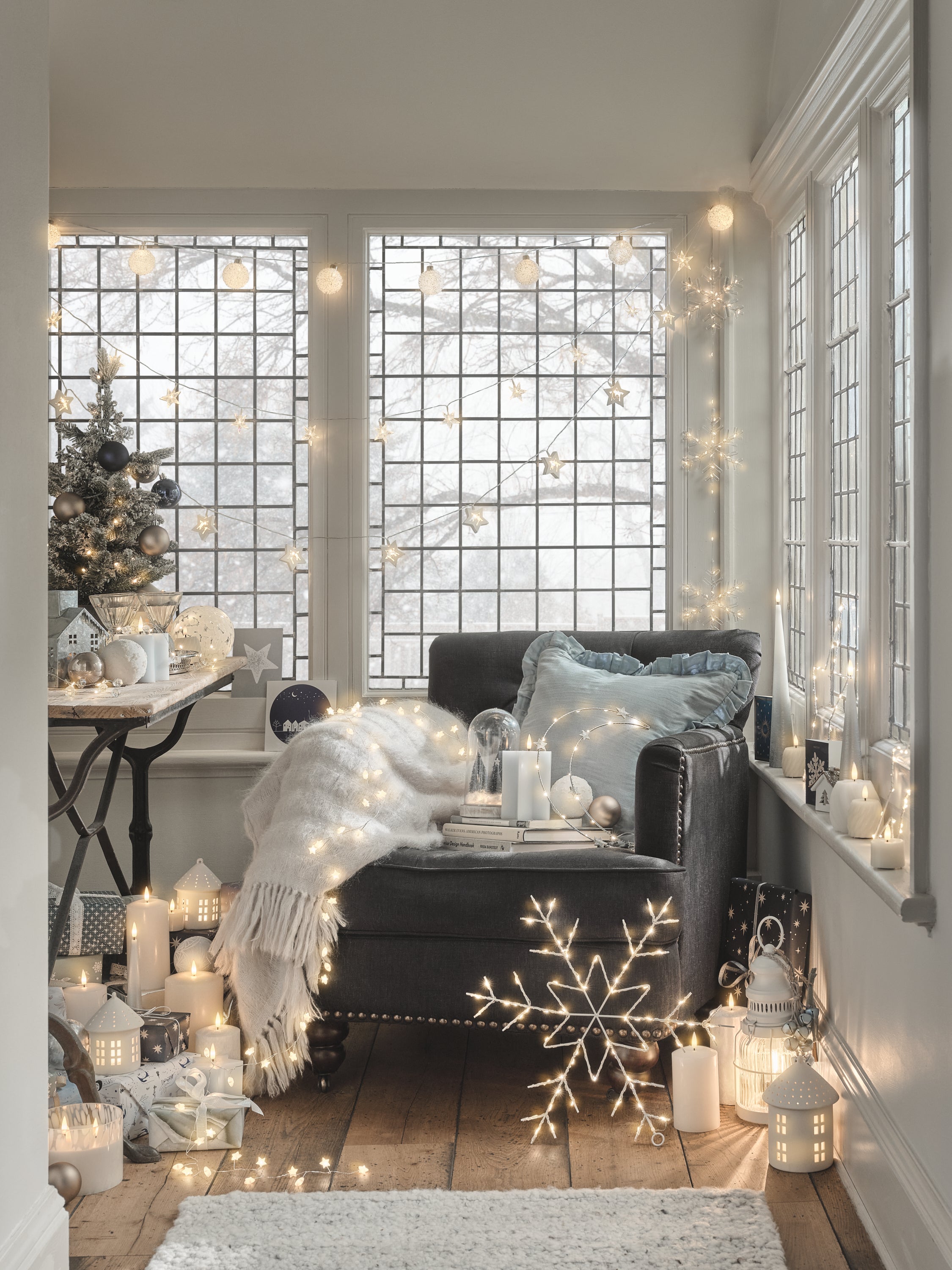 A chair decorated with celestial themed lights and decorations