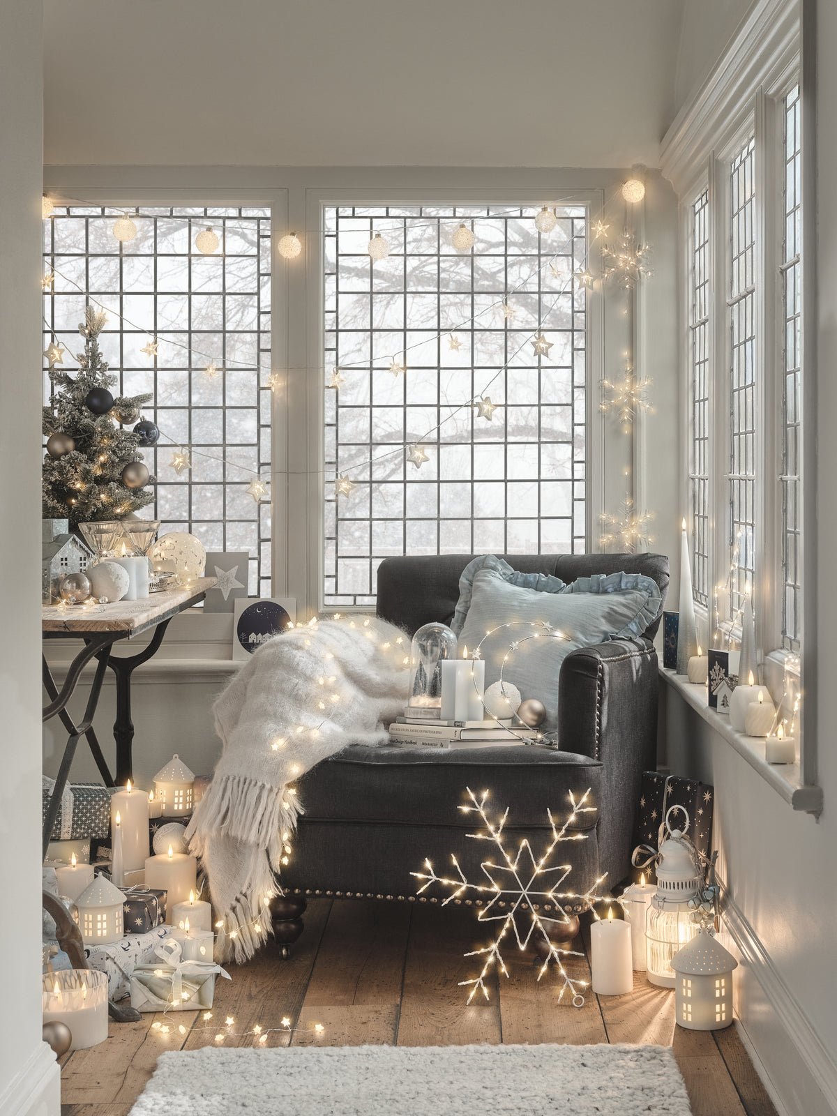 A chair decorated with celestial themed lights and decorations