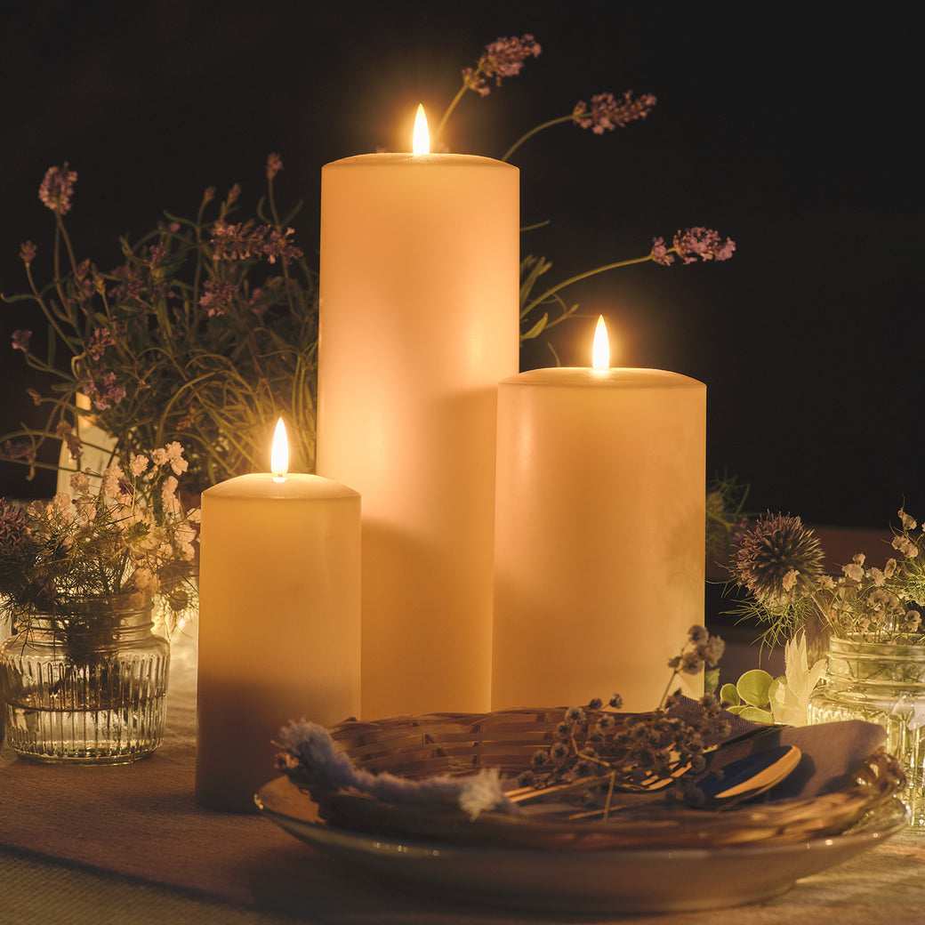 LED candles on an outdoor dining table