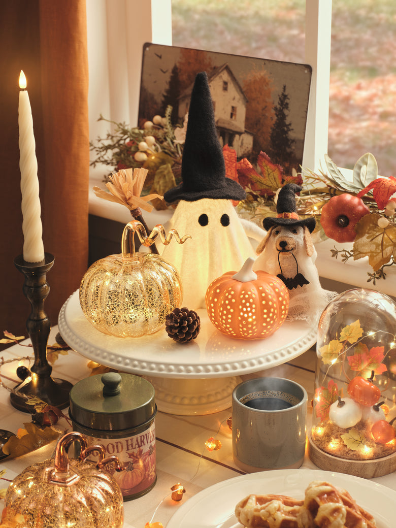 Halloween and pumpkin decorations on a dining table