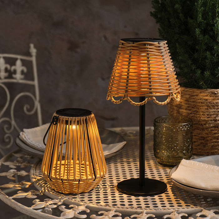 A solar bamboo table lantern and lamp on an outdoor table