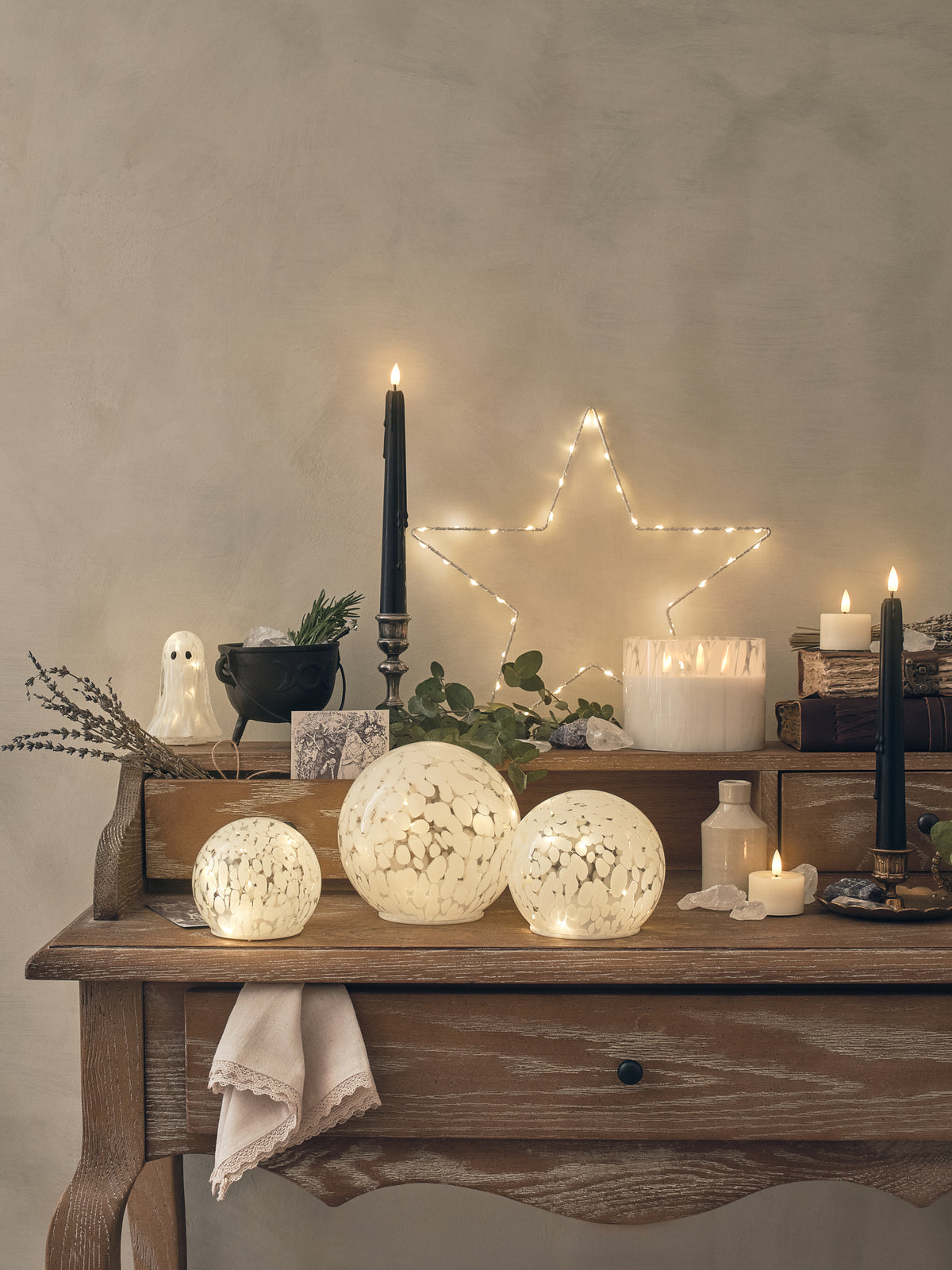 Dressing table decorated with LED candles and Halloween decorations