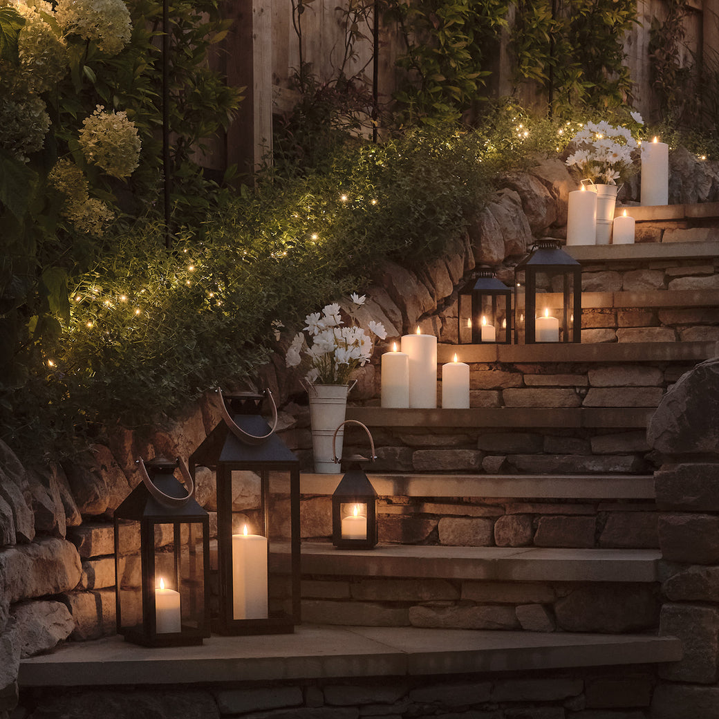 Garden steps with LED candles and lanterns
