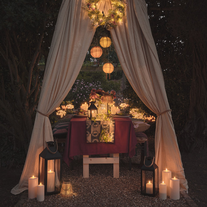 Summer outdoor dining table at twilight