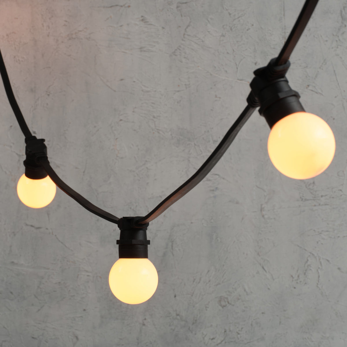 Plus Connect 25m 50 Warm White Connectable Festoon Lights G60 Bulb Frosted Cap Black Cable