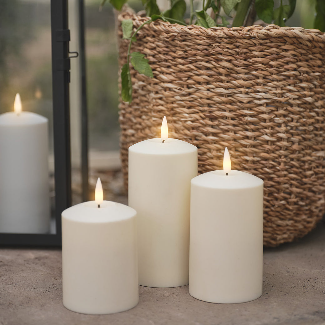3 outdoor LED candles of different sizes