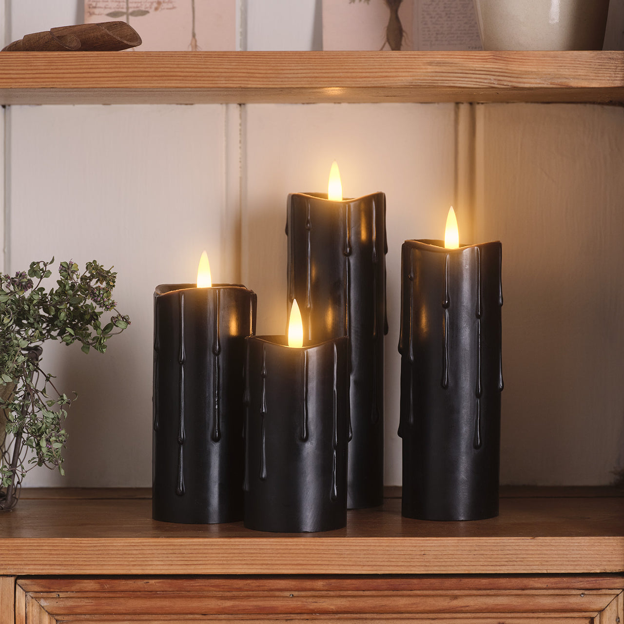 4 TruGlow® Black Dripping Wax LED Slim Pillar Candles