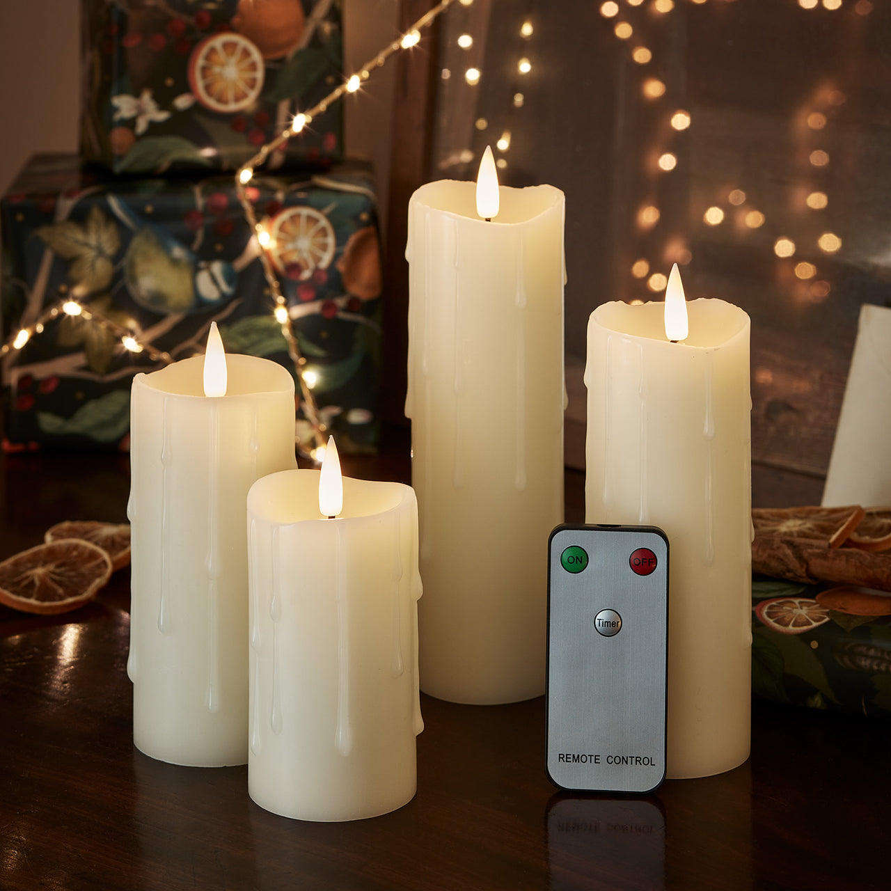 4 Ivory TruGlow® Dripping Wax LED Slim Pillar Candles with Remote Control