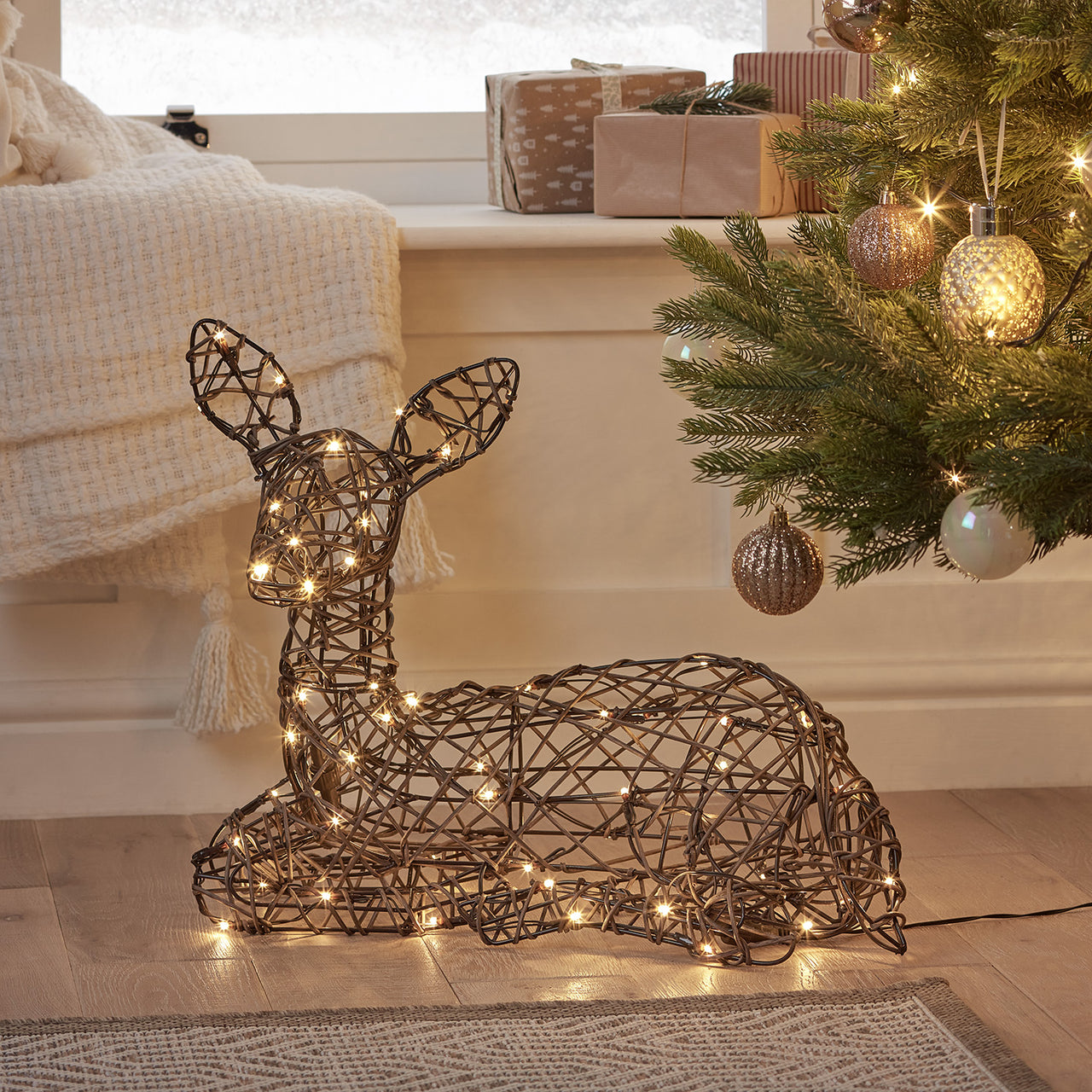 Studley Rattan Resting Fawn Light Up Reindeer 24v